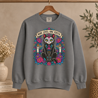 Load image into Gallery viewer, Grey Nine Lives, One Fiesta Day of the Dead black cat crewneck sweatshirt on a wooden hanger
