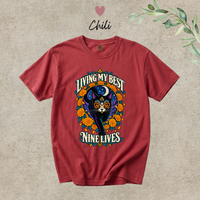 Load image into Gallery viewer, Living My Best Nine Lives Day of the Dead black cat t-shirt with marigolds in Chili red, Comfort Colors
