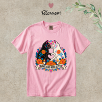 Load image into Gallery viewer, Love Has Nine Lives Brights Day of the Dead black cat t-shirt in Blossom, Comfort Colors
