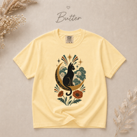Load image into Gallery viewer, Moon and cat graphic tee in muted teal, rust and gold tones on a relaxed-fit garment-dyed shirt
